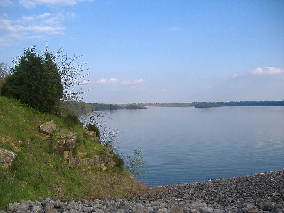 Rocky shoreline and blue water at Barren River Lake.